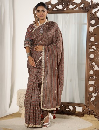 Brown festive look printed muslin saree