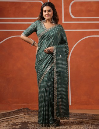Festive green printed muslin saree for special occasions