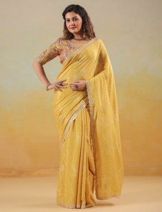 Mustard yellow muslin saree with subtle prints