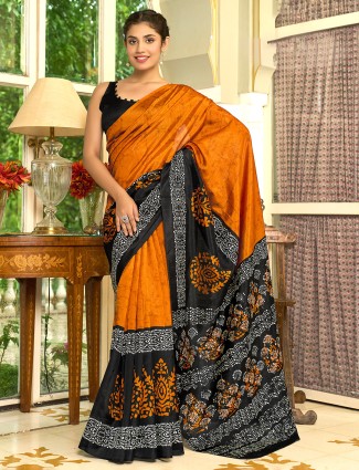 Pastel orange printed saree in bhagalpuri silk