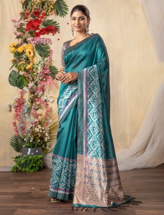 Printed shynthetics saree in pastel blue