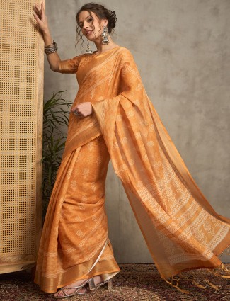 Rust orange pure linen saree with prints
