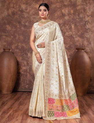 Cream wedding wear saree in tissue silk