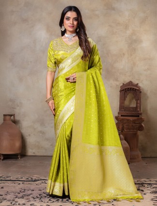 Festive special light green zari worked saree