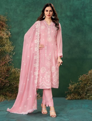 Pastel pink mulmul suit with delicate thread embellishment