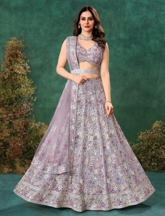 Elegant purple net lehenga set for festive occasions