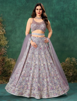 Reception ready purple net lehenga ensemble for women