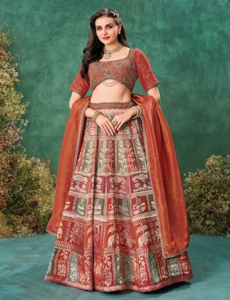 Rust orange tissue silk lehenga with regal finish