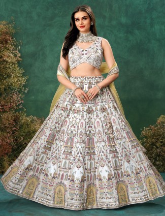White georgette lehenga with delicate embroidery details