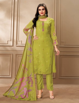 Fresh green cotton suit with handcrafted prints