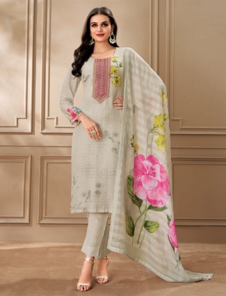 Soft light grey linen suit with subtle patterns