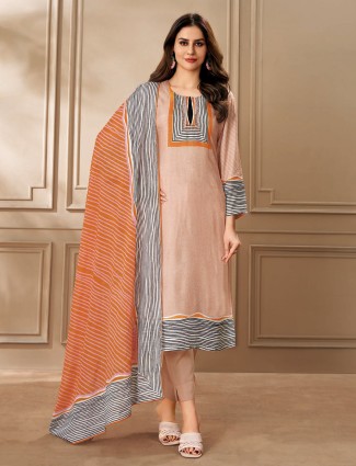Peach toned printed suit in smooth dola silk