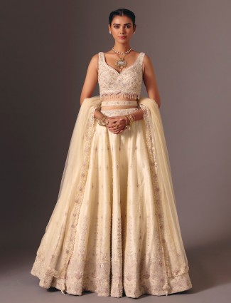 Cream raw silk cutdana bridal lehenga ensemble