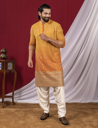 Orange shaded kurta suit with resham