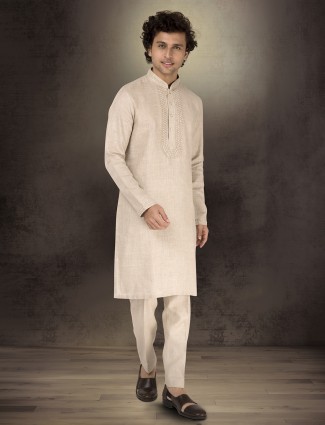 Beige pure linen kurta suit with sequins and cutdana