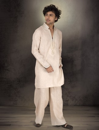 Off white linen kurta with cutdana work