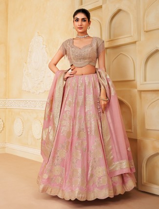 Light pink silk wedding lehenga with zari glow