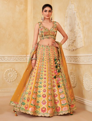 Mustard yellow silk wedding wear lehenga charm