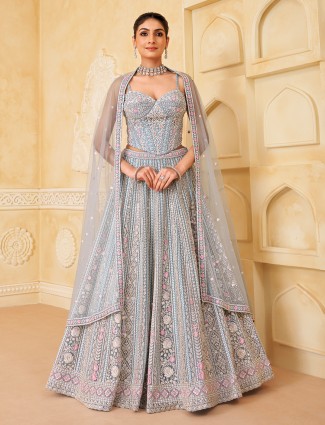 Stone blue silk lehenga with rich embellishment