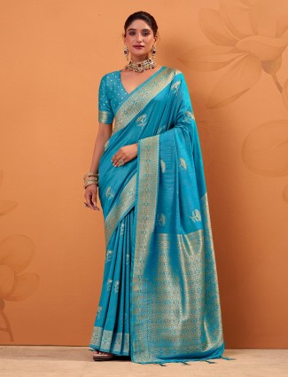 Aqua tusser silk saree accented with zari weaves