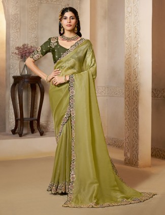 Pista green organza satin saree of soothing charm