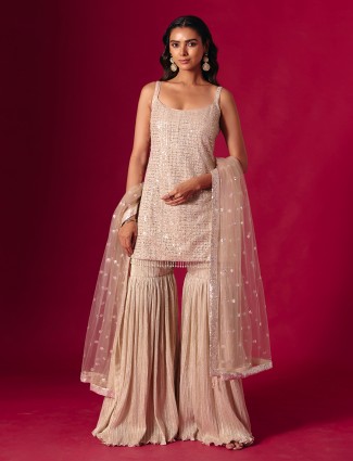Beige chiffon sharara suit with stone work