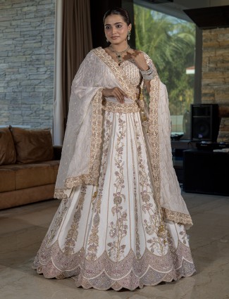 Cream raw silk embellished lehenga choli