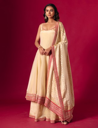 Cream silk sleeveless zari embroidered palazzo suit