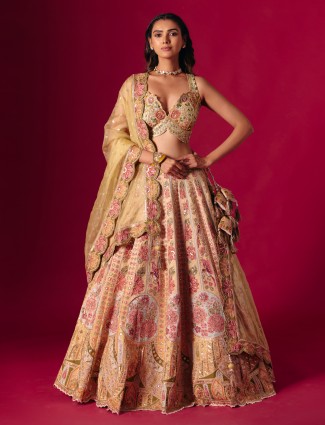 Dusty yellow silk embroidered lehenga choli with diamonds