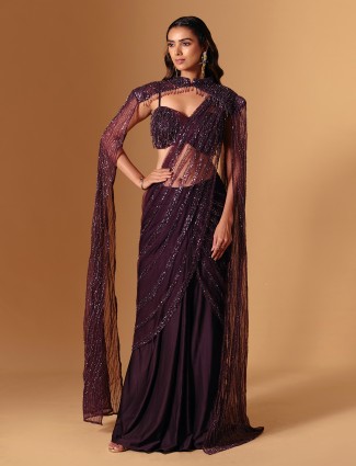 Wine net designer saree with shimmer accents