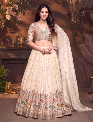 Cream silk v neck mirror detailed lehenga choli