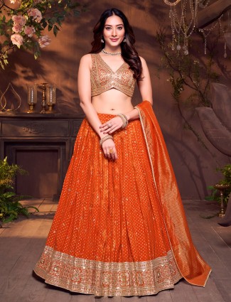 Cream orange designer peacock lehenga choli