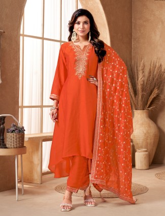 Orange silk suit with heavy mixed work