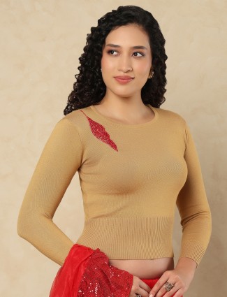 Beige woolen blouse with cutdana highlights