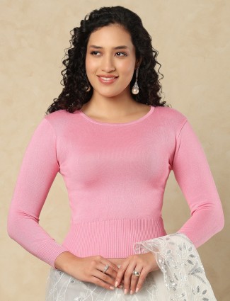 Pink woolen blouse with soft feminine allure