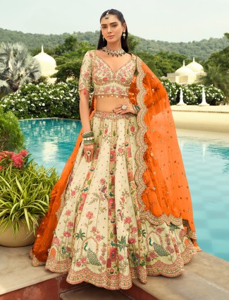 Cream orange designer peacock lehenga choli