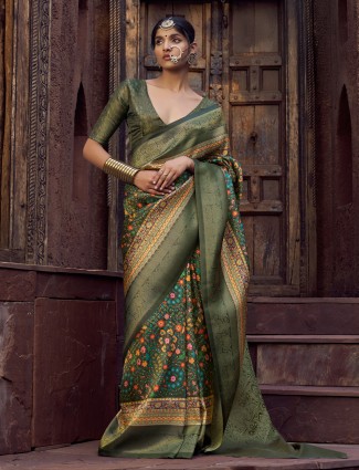 Green silk saree with timeless zari