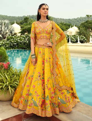Cream orange designer peacock lehenga choli