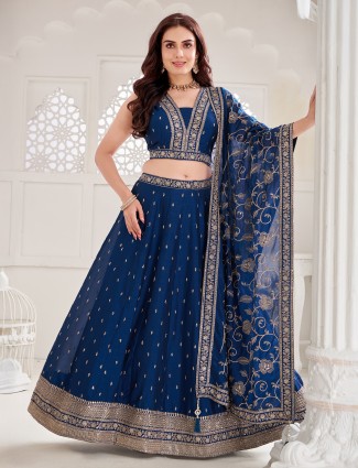 Blue silk lehenga choli with luxe shimmer detailing