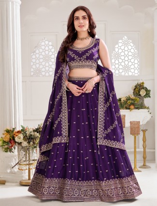 Dark purple silk lehenga choli with royal embellishment glow