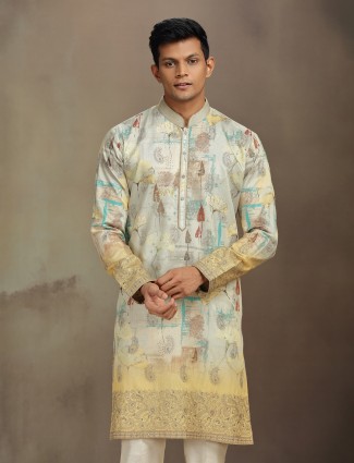 Pista green and cream kurta pajama set embellished with zari