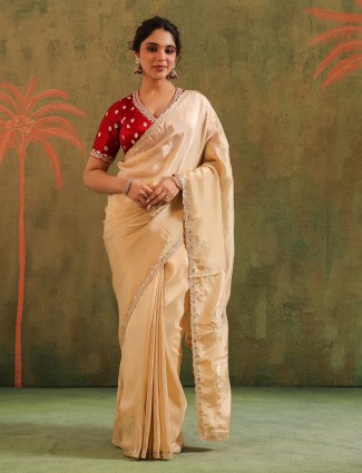 Beige silk saree with maroon blouse for wedding wear
