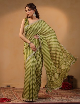 Olive silk saree featuring gota embellishment
