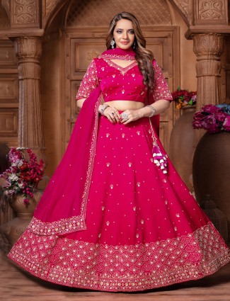 Wine net designer saree with shimmer accents