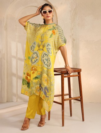 Yellow cutdana work silk kurti set