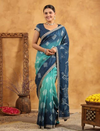 Blue silk saree with a mix of resham and sequins work
