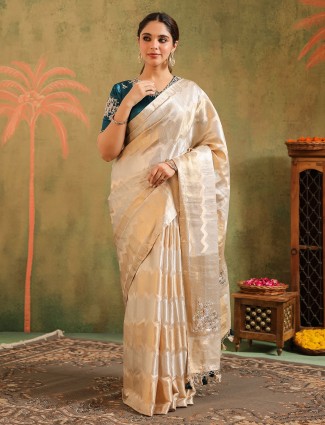 Wedding ready cream silk saree for graceful occasions