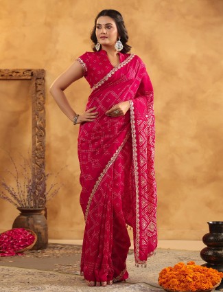 Magenta silk saree highlighted with subtle resham work