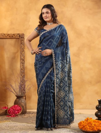 Navy silk saree enriched with aabla highlights