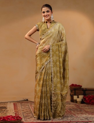 Olive silk saree with sequins and aabla shimmer detailing